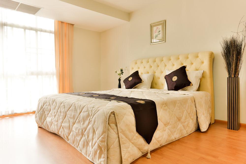 The Capital Resort @ Sukhumvit 50 Bangkok Exterior foto A bedroom at the hotel